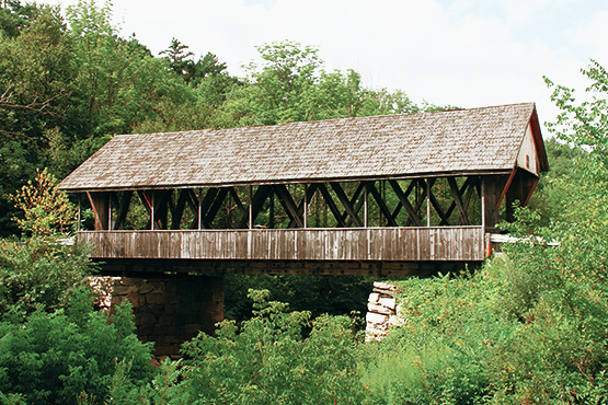 covered bridge over river