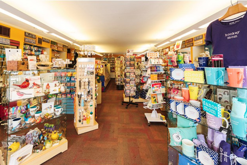 interior of black's paper store gift shop with jewelry, clothes, and other gift displays